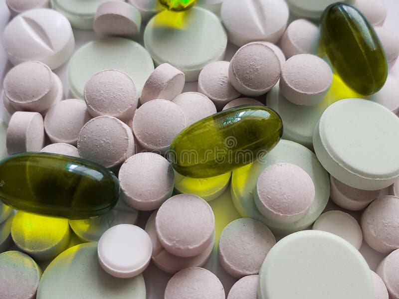acerqúese a la variedad de medicinas en cápsulas y las tabletas, fondo y textura fotos de archivo libres de regalías acerqúese a la variedad de medicinas en cápsulas y las tabletas, fondo y textura fotos de archivo libres de regalías