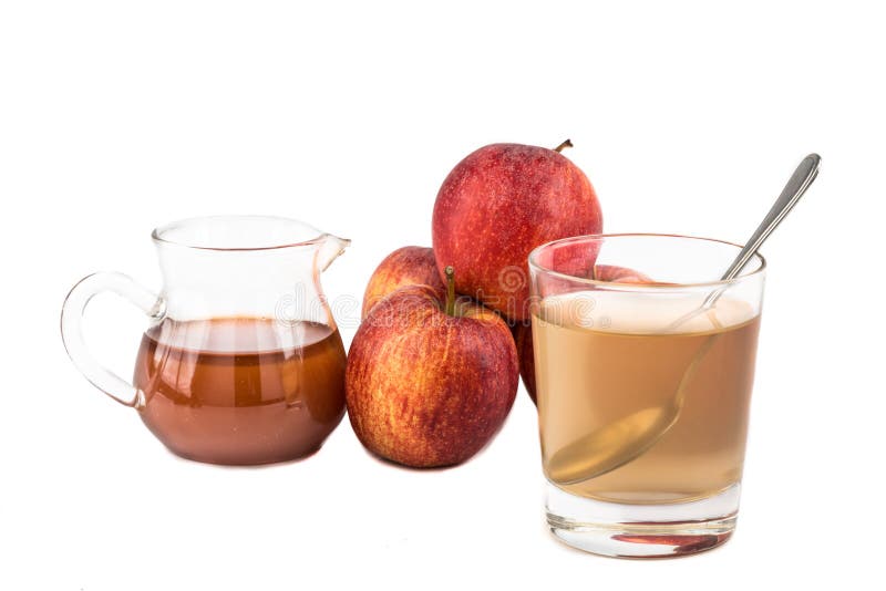 Aceto di sidro di Apple, un rimedio domestico ad infiammazione di gotta immagini stock Aceto di sidro di Apple, un rimedio domestico ad infiammazione di gotta immagini stock