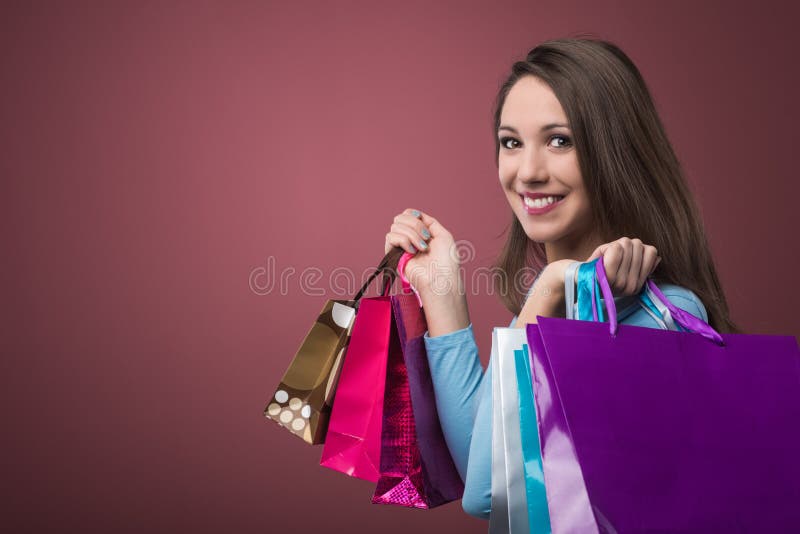 Achats gais de femme photo stock Achats gais de femme photo stock