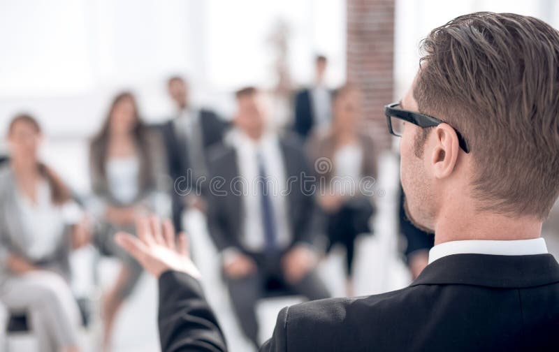 Rear view.businessman looking in the conference room.business background. Rear view.businessman looking in the conference room.business background