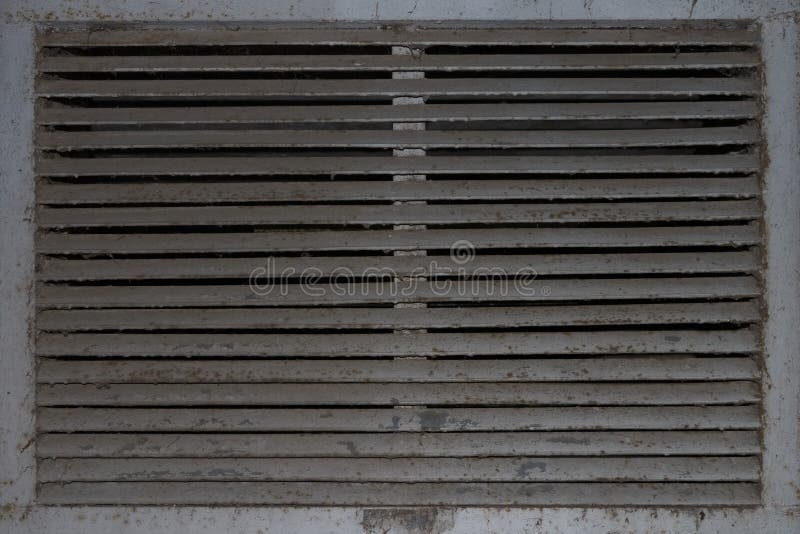 Achtergrondrooster van een oude verlaten uitlaatkap royalty-vrije stock foto Achtergrondrooster van een oude verlaten uitlaatkap royalty-vrije stock foto