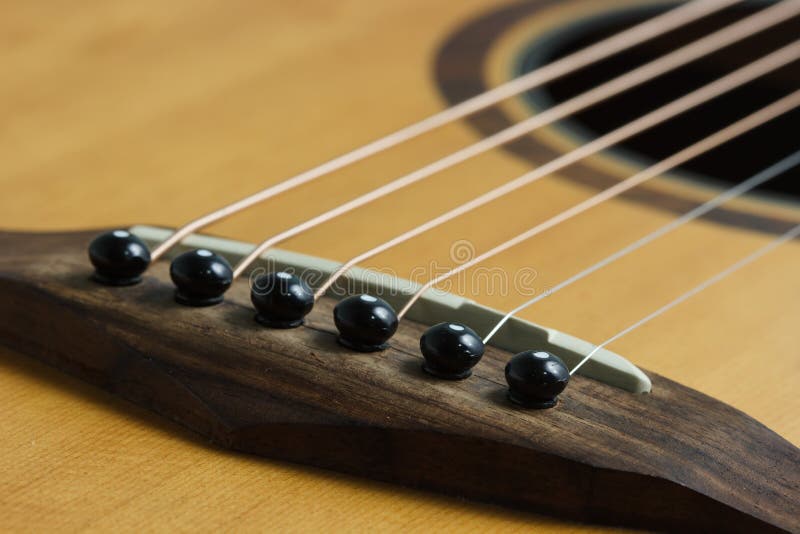 Acoustic Guitar Bridge Pins and Saddle, Select Focus Stock Photo