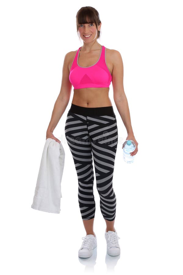 Acqua di bottiglia della donna di forma fisica che sta all'addestramento i di allenamento di sport fotografie stock Acqua di bottiglia della donna di forma fisica che sta all'addestramento i di allenamento di sport fotografie stock