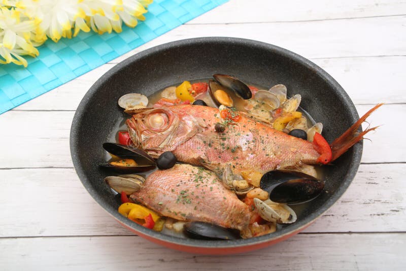 Golden Eye Snapper Simmered in Soy Sauce Stock Photo - Image of spinach,  grill: 168189888