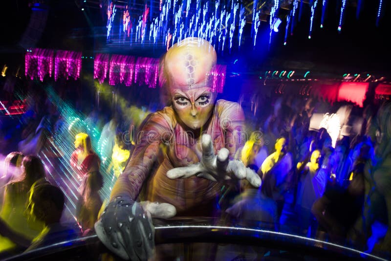 Acrobat dancer at crazy party. stock photo Acrobat dancer at crazy party. stock photo