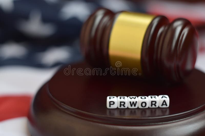 Justice mallet and PRWORA acronym close up. Personal responsibility and work opportunity reconciliation act. Justice mallet and PRWORA acronym close up. Personal responsibility and work opportunity reconciliation act