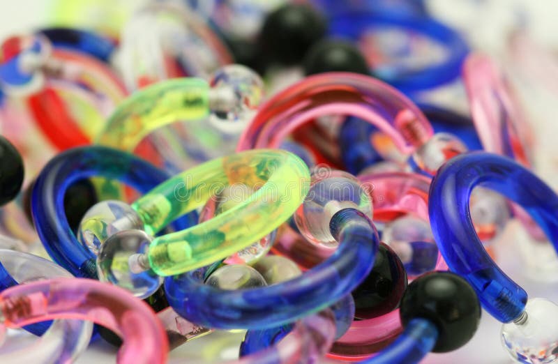 Acrylic Body Jewelry stock image. Image of hoops, pierce 2542555