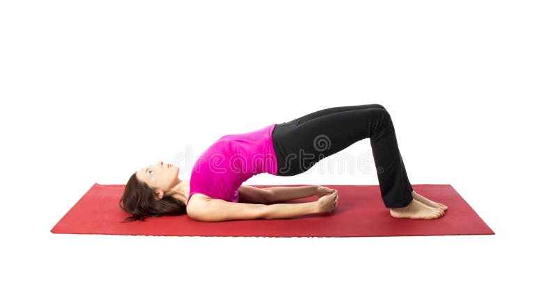 Actitud del puente en yoga y Pilates fotografía de archivo libre de regalías Actitud del puente en yoga y Pilates fotografía de archivo libre de regalías