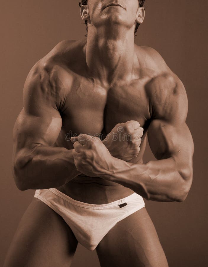 Actitud masculina del cangrejo del bodybuilder imagen de archivo