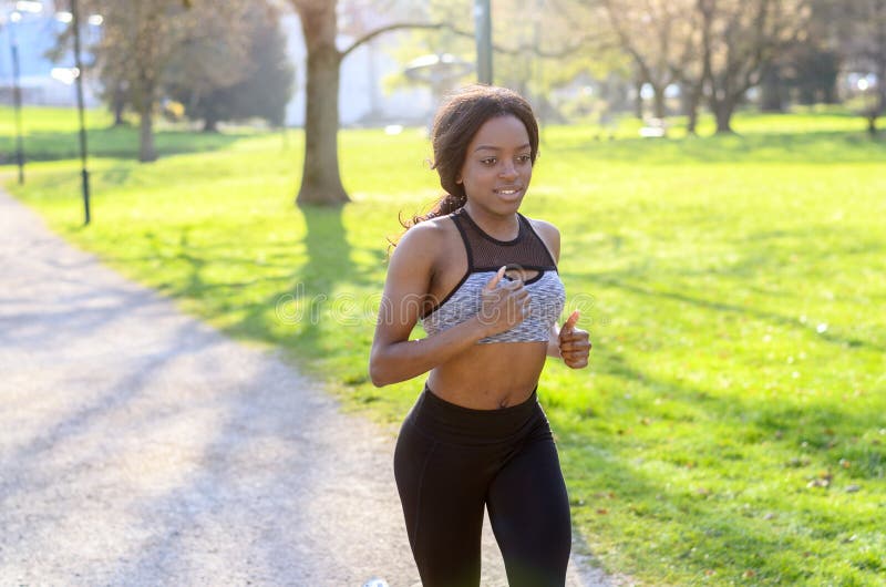 Active Athletic Young Woman Out Jogging Stock Image - Image of african ...