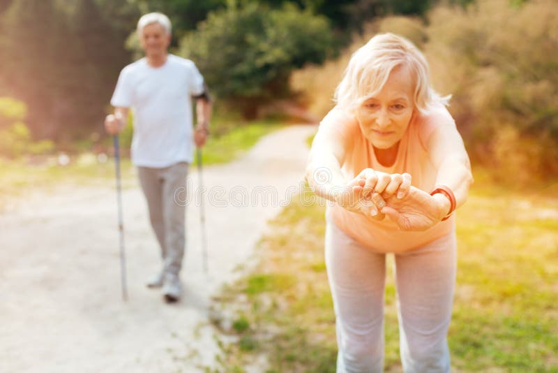 Active Elderly Woman Doing a Bending Exercise Stock Image Image of