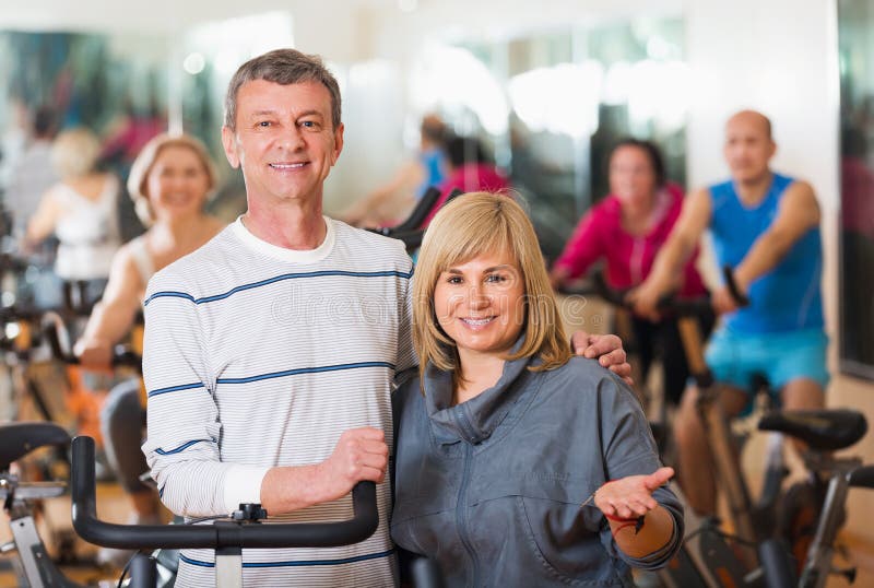 Elderly Couple Exercising In Gym Stock Image Image Of Physical