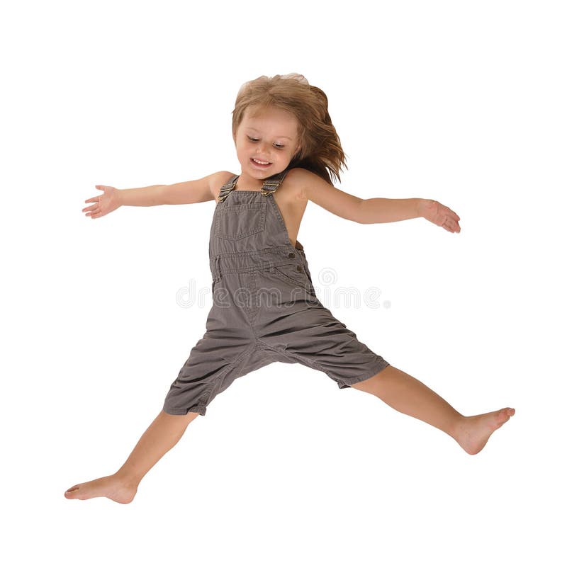 Active jumping girl in rompers isolated on white