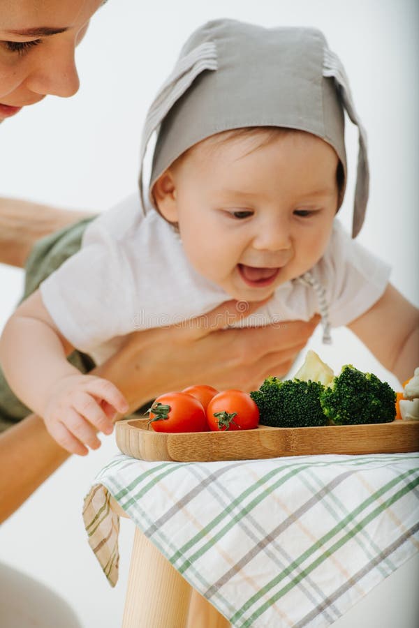 Active restless infant child is presented food