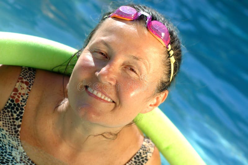 Active senior in the pool