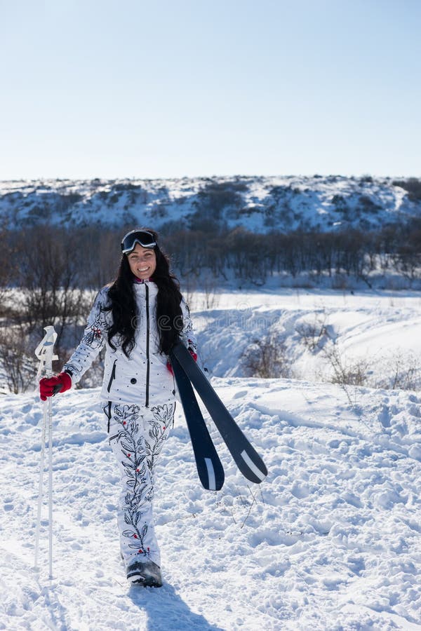 Active Ski Woman at the Snow Smiling at the Camera