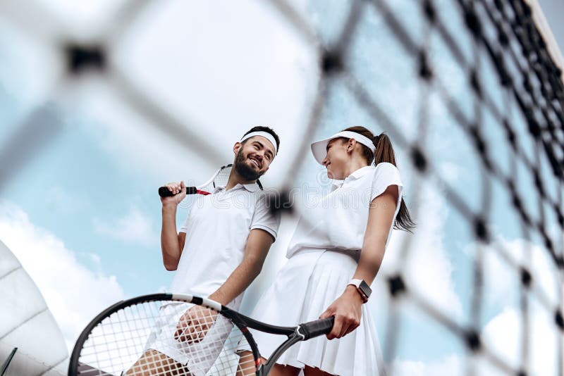 Active Weekend Together. Lovers Play Tennis Stock Photo - Image of game ...