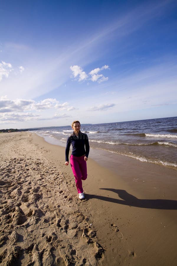 Active woman on the beach