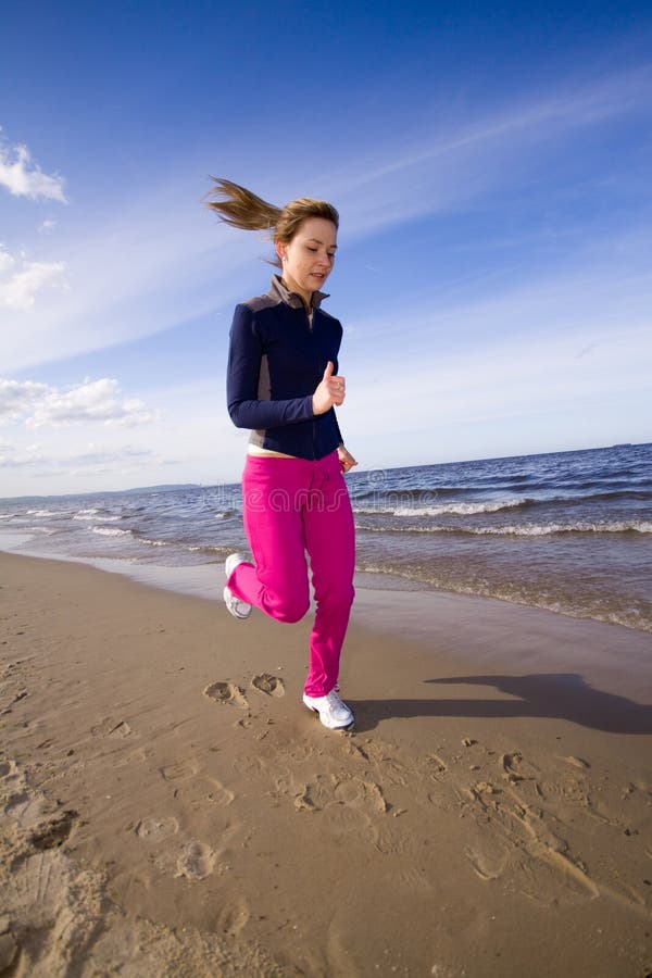 Active woman on the beach