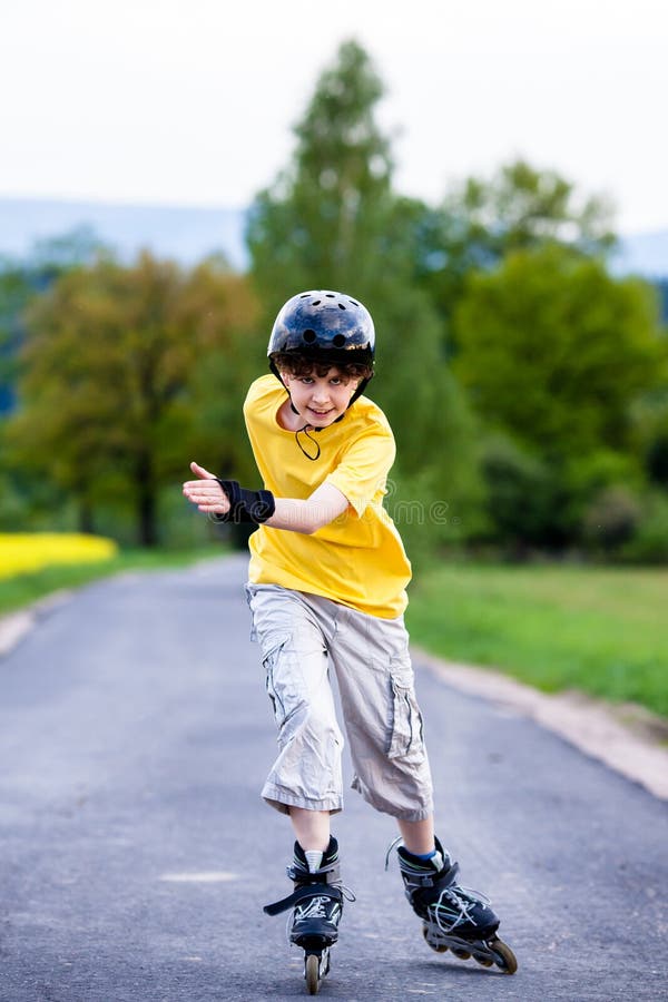 Active young people - rollerblading, skateboarding royalty free stock photography Active young people - rollerblading, skateboarding royalty free stock photography