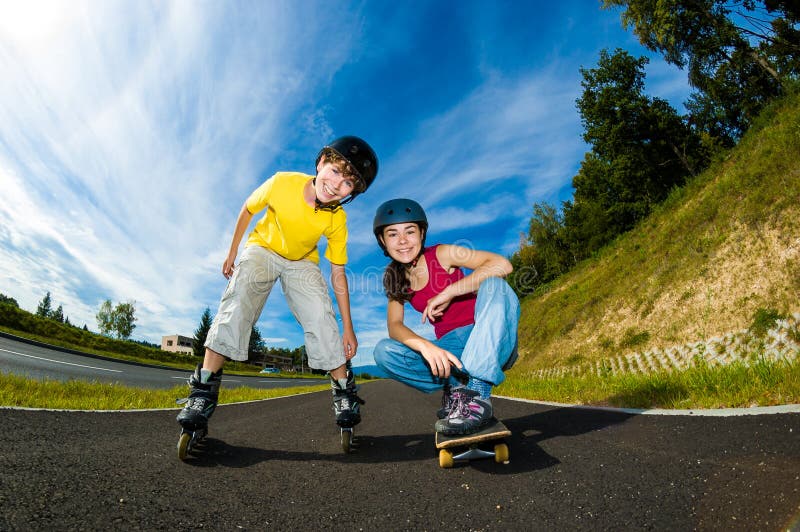 Active young people - rollerblading, skateboarding stock image Active young people - rollerblading, skateboarding stock image