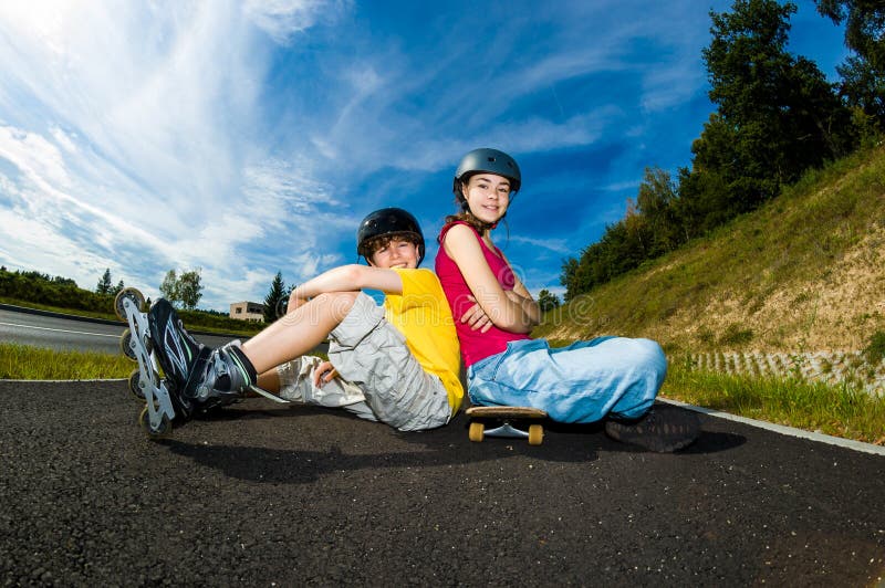 Active young people - rollerblading, skateboarding stock photography Active young people - rollerblading, skateboarding stock photography