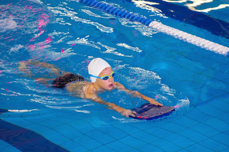 Activities on the pool children swimming fitness, competition