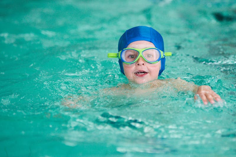 Activities on the Pool. Cute Boys Swimming and Playing in Water Stock