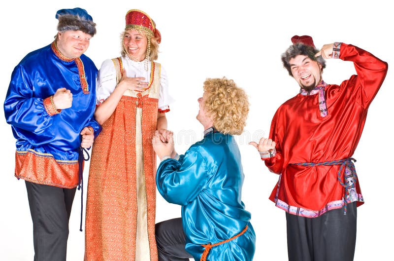 Group of actors dressed in Russian folklore costumes. Scene depicting a Father protecting his Daughter from two competing suitors. Folklore costumes stock images, royalty-free photos and pictures