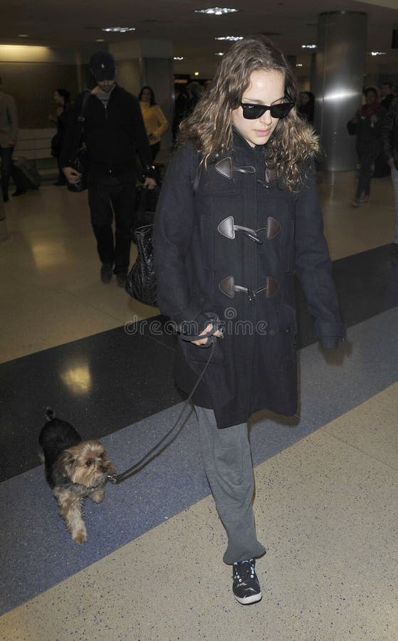 Actress Natalie Portman with dog at LAX airport stock image Actress Natalie Portman with dog at LAX airport stock image
