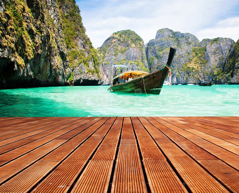 Adaman sea and wooden boat in Thailand