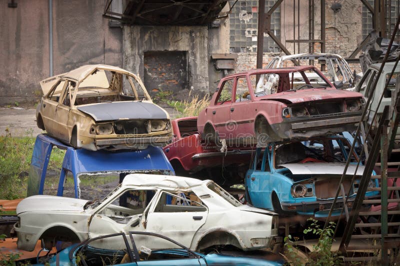 Old cars at abandoned scrapyard. Old cars at abandoned scrapyard