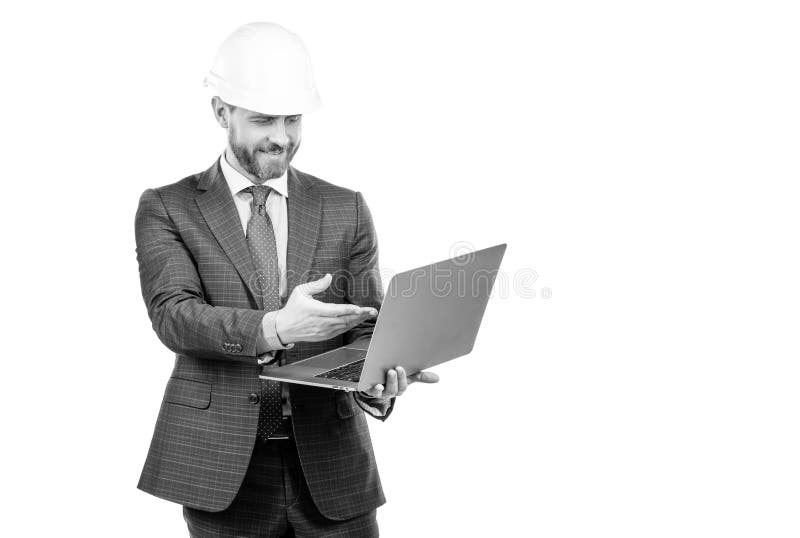 Adapting to computing technology. Civil engineer do computing. Professional man in hardhat use laptop. Computer for engineering and constructing. Digitization, copy space.