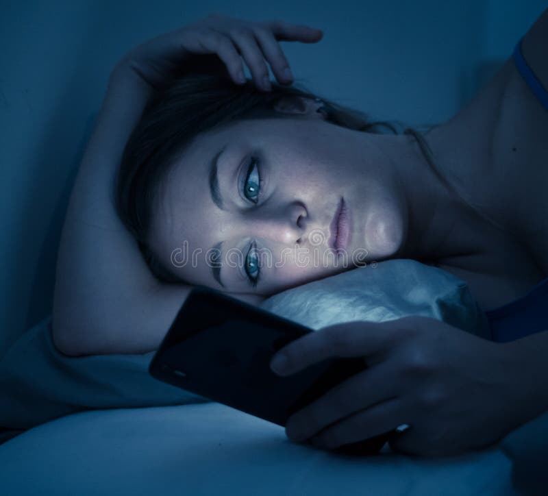 Attractive Woman Addicted To Mobile Phone Late At Night In