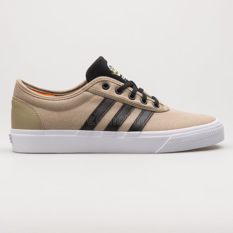 Adidas Adi Ease Beige And Black Sneaker Editorial Photography - Image of  fitness, laces: 181210127