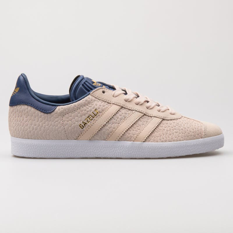 Adidas Gazelle Beige and Navy Blue Sneaker Editorial Photography ... زيت عباد الشمس