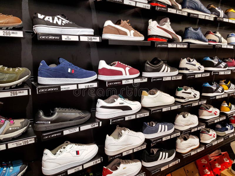 Adidas, Puma Sport Shoes In Row At 