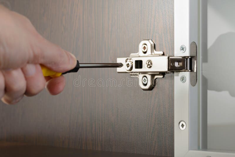 Adjusting a Concealed Hinge Stock Image Image of fitting, screwed