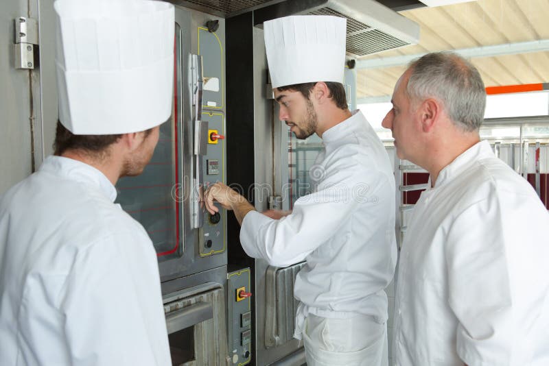 Adjusting the Oven Temperature Stock Photo Image of knob, bake 119528678