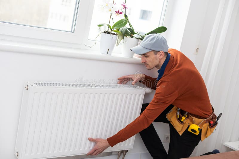 Adjustment of Heating Radiator. Temperature. Stock Photo Image of