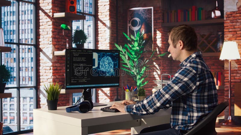 Admin using computer in home office for artificial intelligence computing royalty free stock image