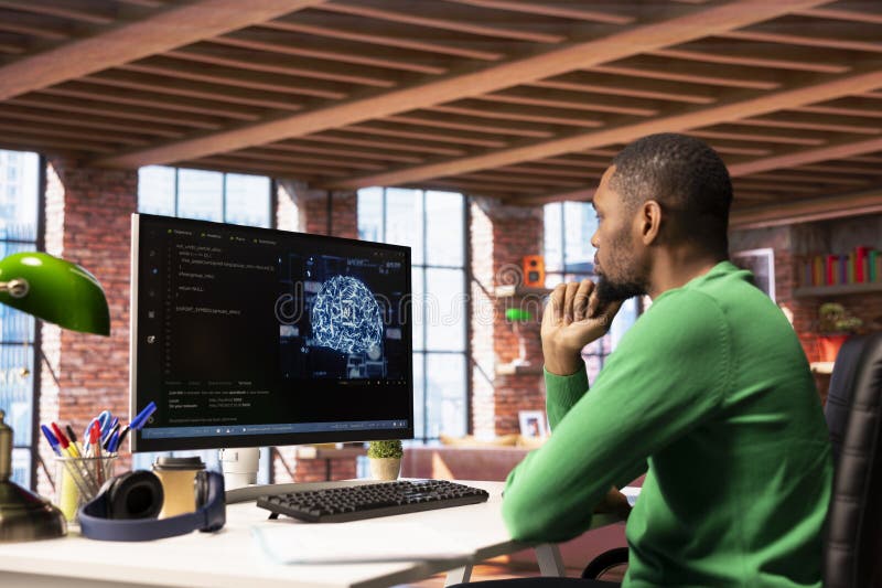 Admin writing code on PC and doing maintenance on artificial intelligence royalty free stock images