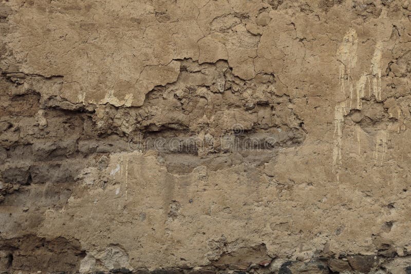 Adobe helft-geruïneerde muur met interessante hulp, Horizontaal formaat royalty-vrije stock foto's Adobe helft-geruïneerde muur met interessante hulp, Horizontaal formaat royalty-vrije stock foto's