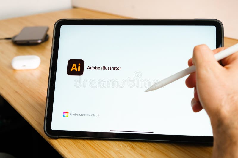 Adobe Illustrator Draw Logo Shown By Apple Pencil On The Ipad Pro Tablet Screen Man Using Application On The Tablet Editorial Photography Image Of Screen Communication