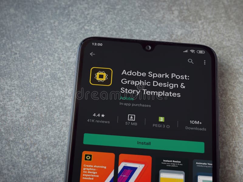 Adobe Spark Post - Graphic Design and Story Templates app play store page on a smartphone on ceramic stone background