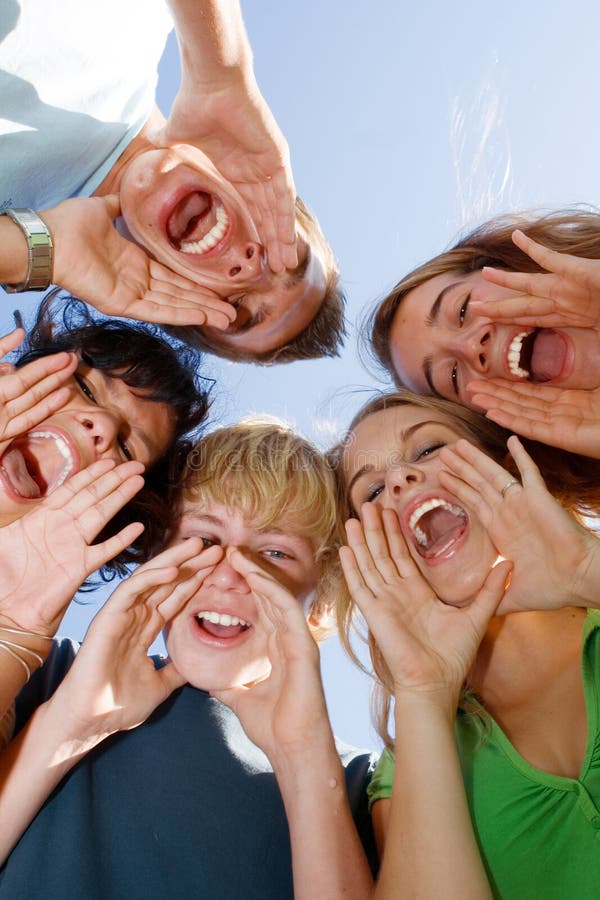 Group of happy teens or teenagers calling or singing. Group of happy teens or teenagers calling or singing