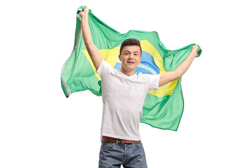 Adolescent entuziasmat care deține un steag brazilian royalty free stock photography