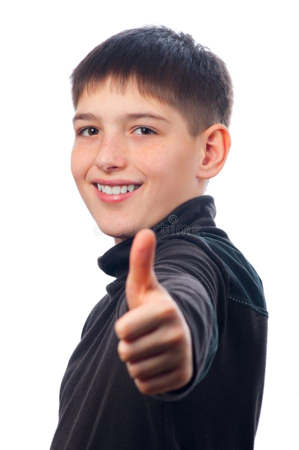 Adolescente feliz que mostra os polegares acima fotos de stock royalty free Adolescente feliz que mostra os polegares acima fotos de stock royalty free