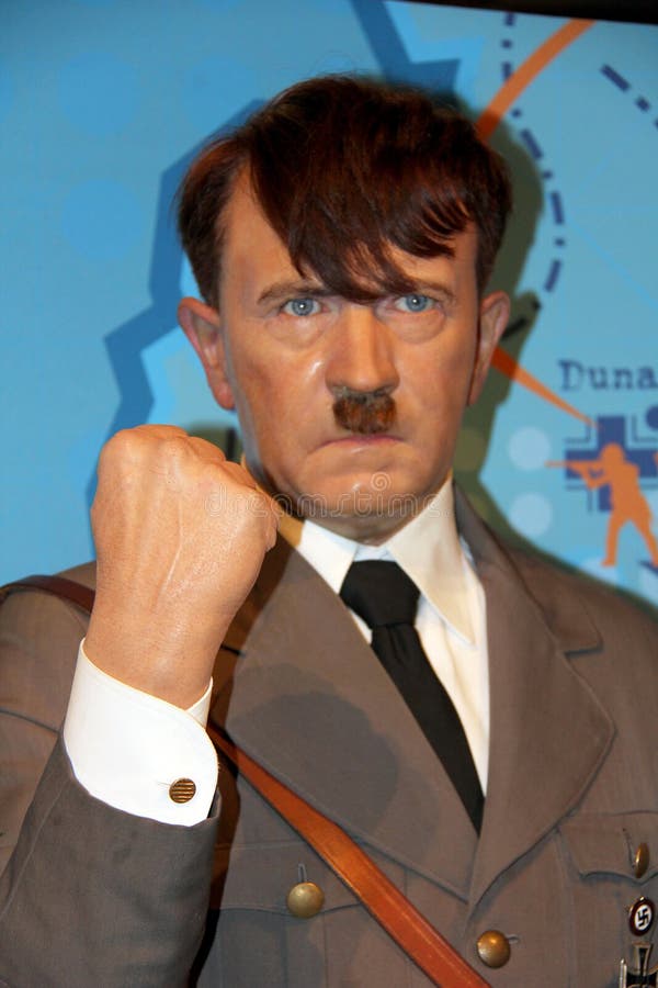London, - United Kingdom, 08, July 2014. Madame Tussauds in London. Waxwork statue of Adolf Hitler. Created by Madam Tussauds in 1884, Madam Tussauds is a waxwork museum and tourist attraction exhibiting celebrity life size wax statues. This museum allows people to touch and to be photographed with the waxwork statues. Photo taken on: 8th July, 2014