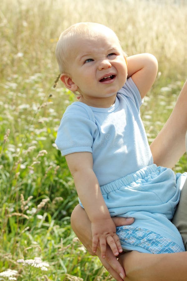 Adorable baby boy outdoors stock photo. Image of family 12244284